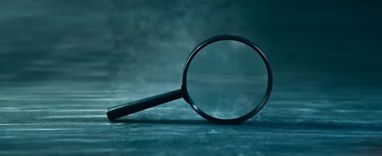 Magnifying glass representing AI-powered search advertising and campaign reporting