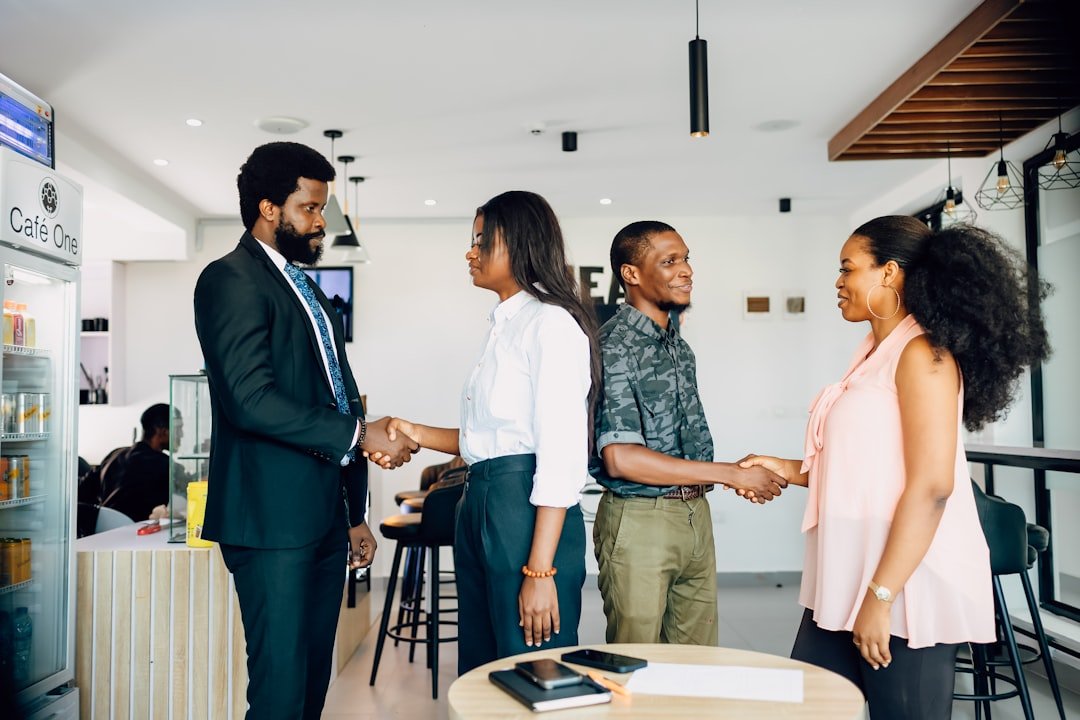 Small business professionals building customer trust through a new partnership