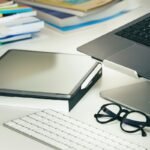 Organized home office workspace illustrating digital document management